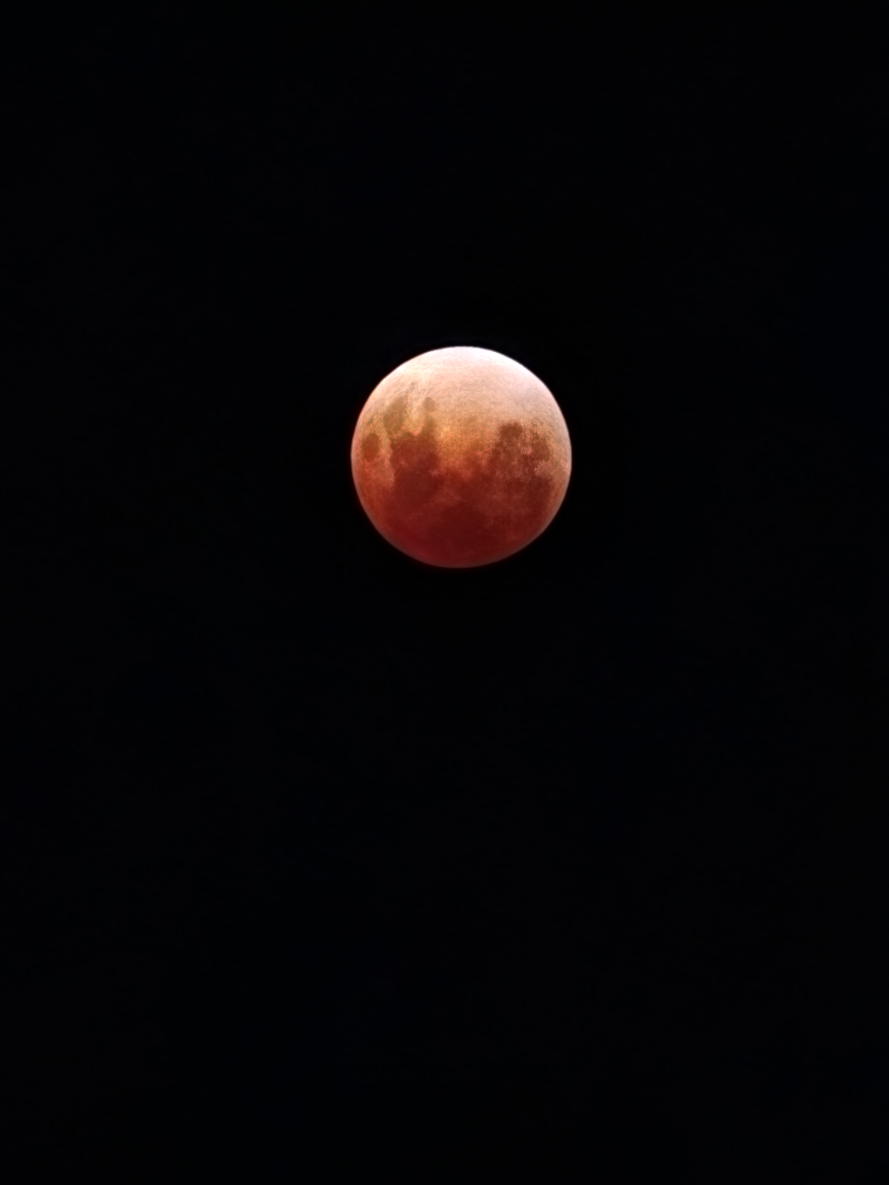 Tonight, the full moon turned red in a rare, 