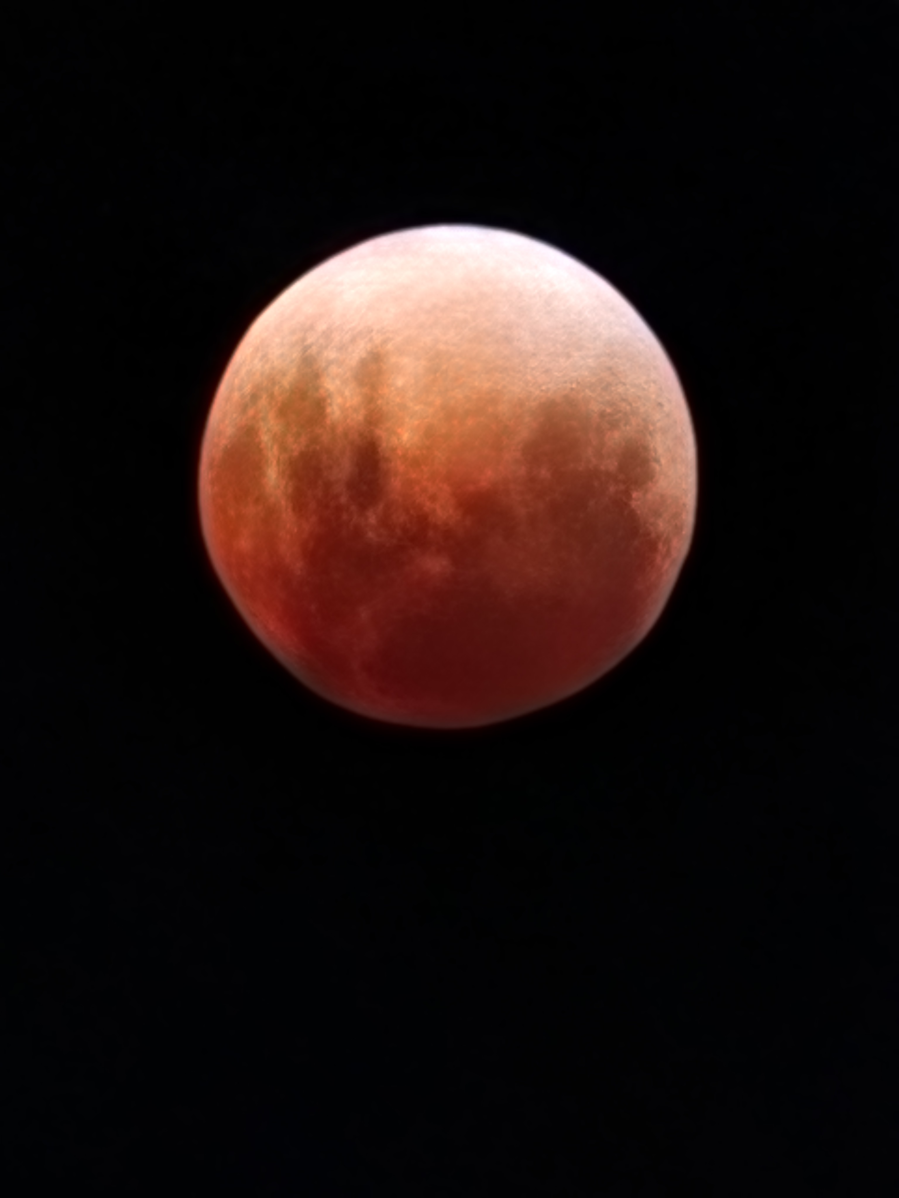 Tonight, the full moon turned red in a rare, 